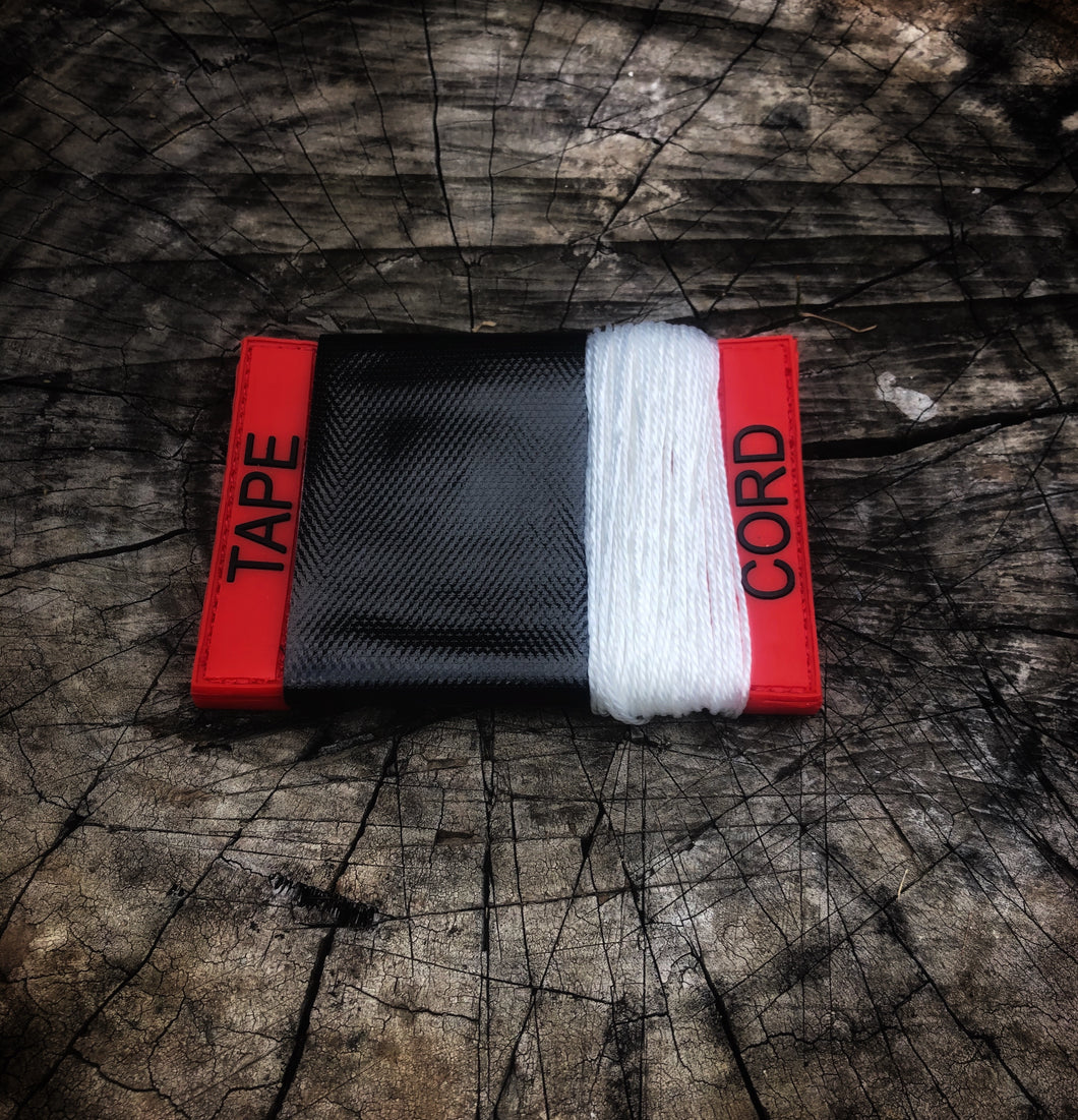 Red CORD-TAPE pvc patch holder.