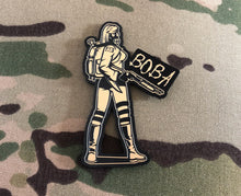 Load image into Gallery viewer, BOBA Gasgirl laser engraved plastic laminate gold limited edition patch. Size 90mm x 60mm.